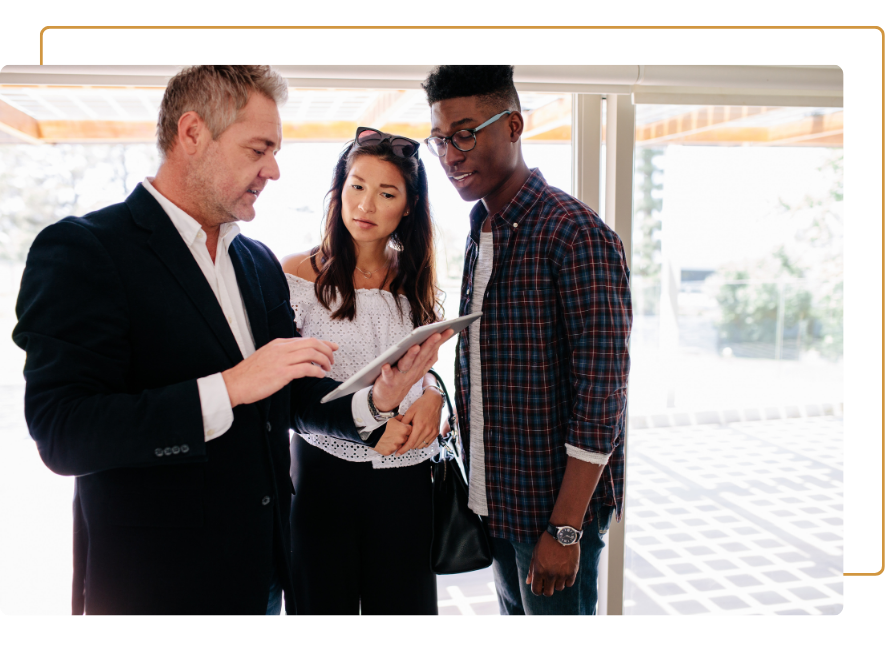 realtor looking over plans with client