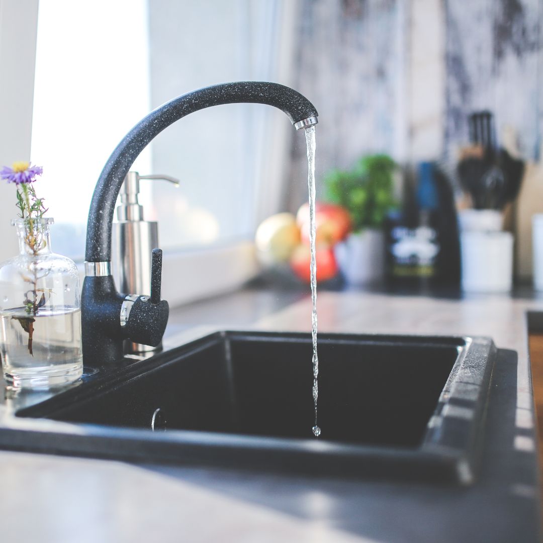 Water coming out of a faucet